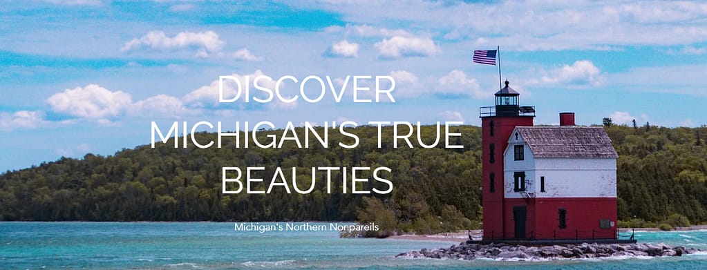 Autumn Tashman's "Discover Michigan's True Beauties:" a red and white lighthouse sitting on rocks jutted out into the blue lake, and a forest of trees in the background.