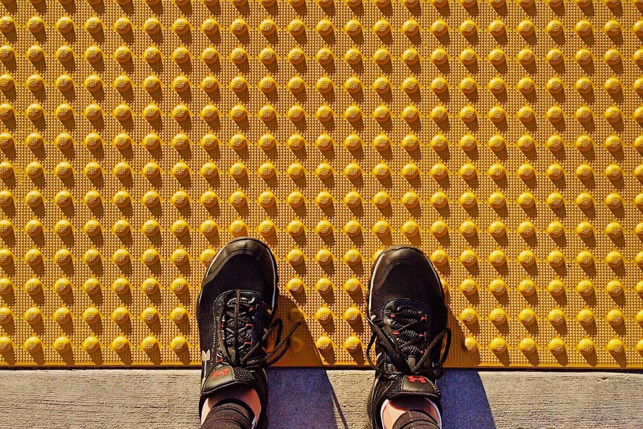 A pair of shoes on the accessible safety thread