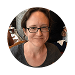 smiling woman wearing glasses