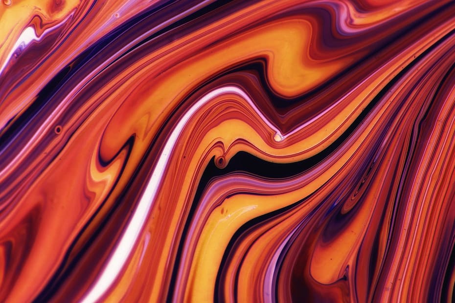 Abstract red, orange, and burgundy color swirls.